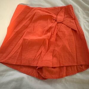 Orange skort. Size S. Brand / glam